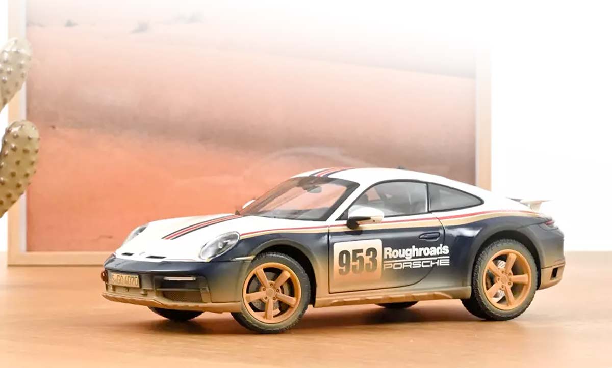 Porsche 911 Dakar de Norev à l'échelle 1/18